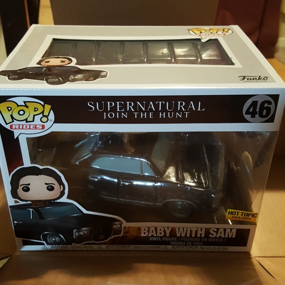 Sam with baby funko pop